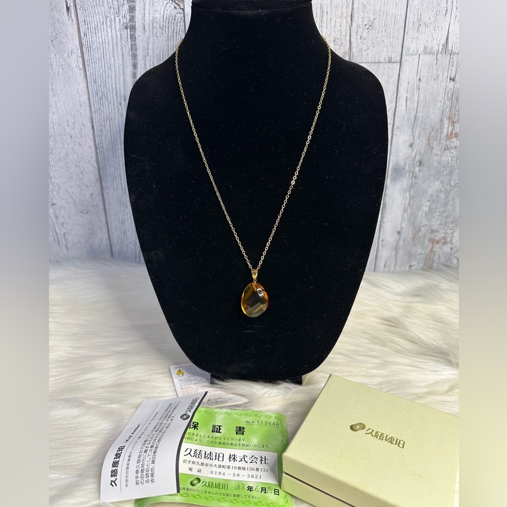 AMBER necklace in 18k gold and plated chain - Picture 13 of 17